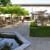 Ansicht Brunnen Platanen- und Bistrogarten Sommer
